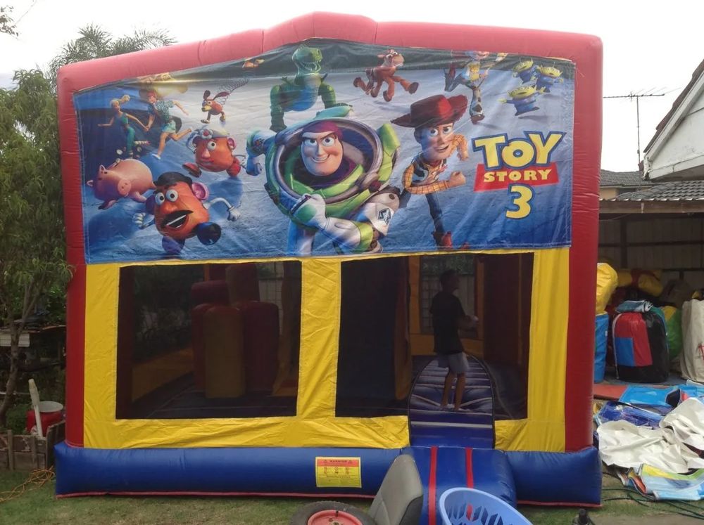 Hire TOY STORY 3 IN 1 COMBO WITH SLIDE POP UPS & TUNNEL & BASKETBALL HOOP AGES 3 TO 13, hire Jumping Castles, near Doonside