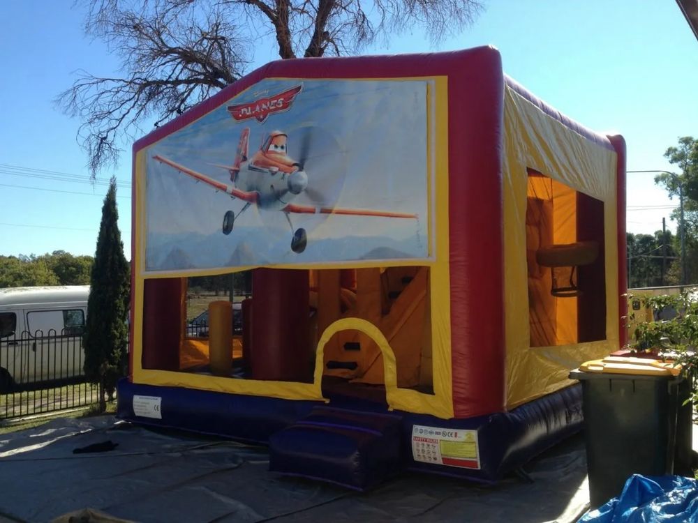 Hire PLANES 5 IN 1 COMBO WITH SLIDE POP UPS AND BASKETBALL HOOP AND OBSTACLE SIZE 5X5M, hire Jumping Castles, near Doonside