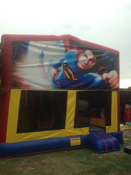Hire SUPERMAN JUMPING CASTLE WITH SLIDE