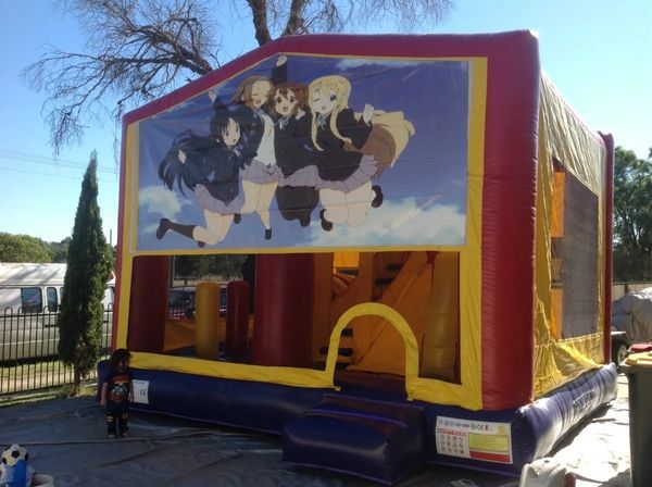 Hire GIRL POWER JUMPING CASTLE WITH SLIDE