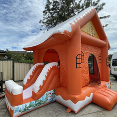 Hire SNOWING ORANGE CHRISTMAS HOUSE WITH SLIDE POP UPS AND BASKETBALL HOOP 4x4.5m