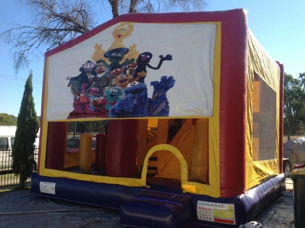 Hire SESAME STREET JUMPING CASTLE WITH SLIDE, hire Jumping Castles, near Doonside