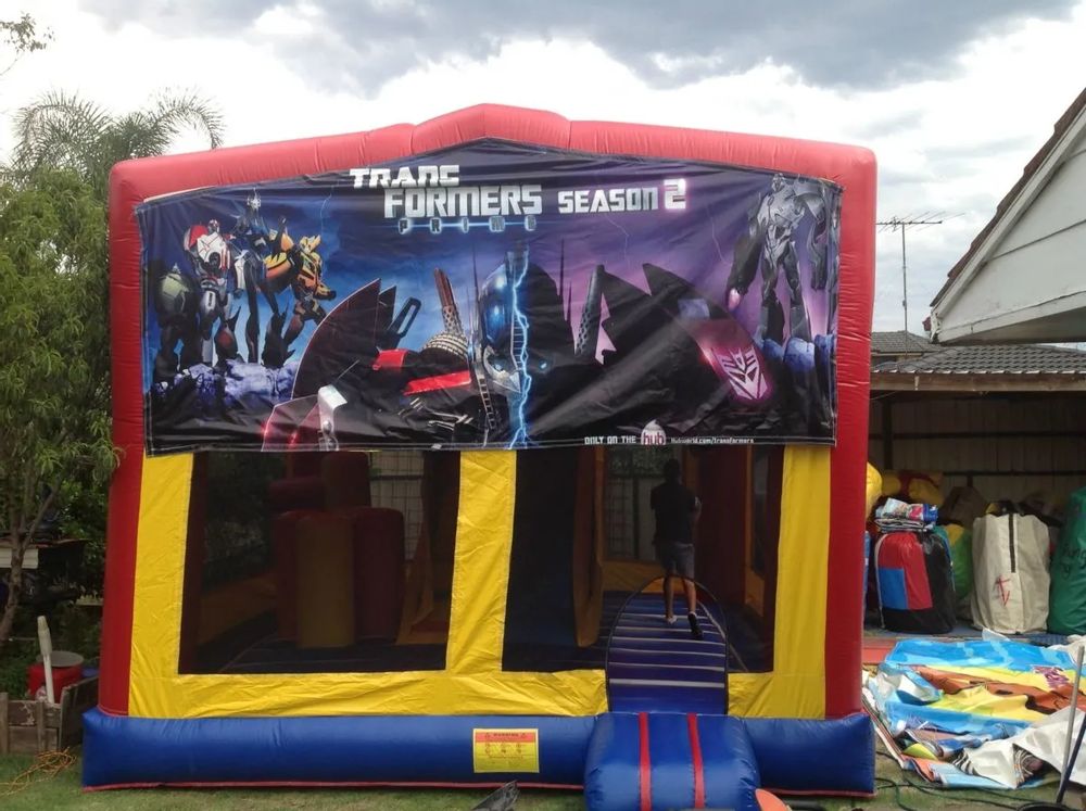 Hire TRANSFORMERS SEASON 2 JUMPING CASTLE WITH SLIDE, hire Jumping Castles, near Doonside