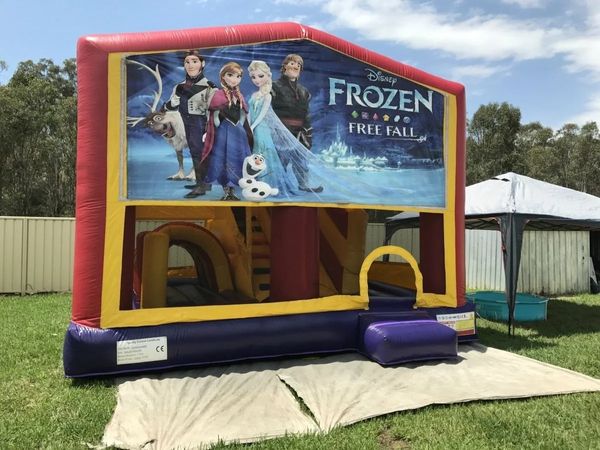 Hire FROZEN JUMPING CASTLE WITH SLIDE