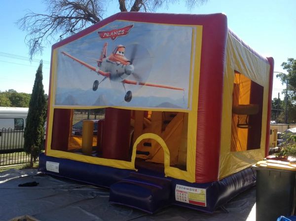 Hire PLANES JUMPING CASTLE WITH SLIDE