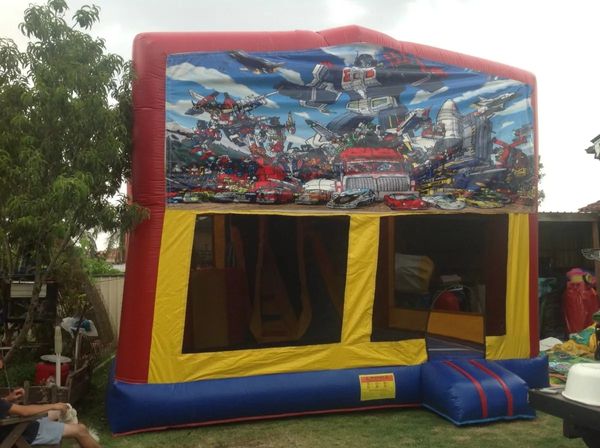 Hire TRANSFORMERS JUMPING CASTLE WITH SLIDE