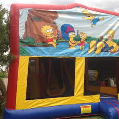Hire SIMPSONS JUMPING CASTLE WITH SLIDE
