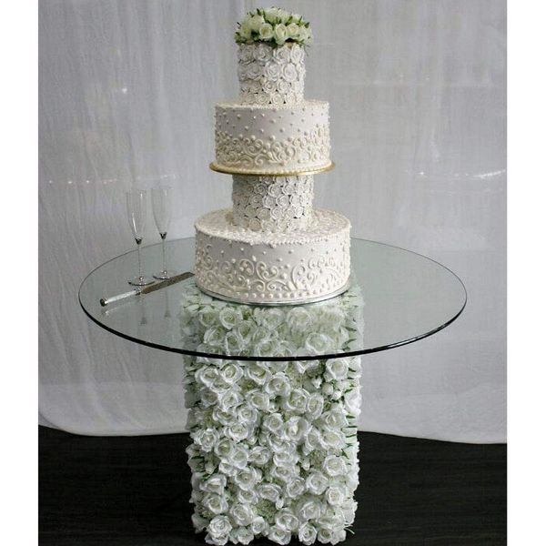 Hire CAKE TABLE WITH SILK FLOWER BASE, from Weddings of Distinction