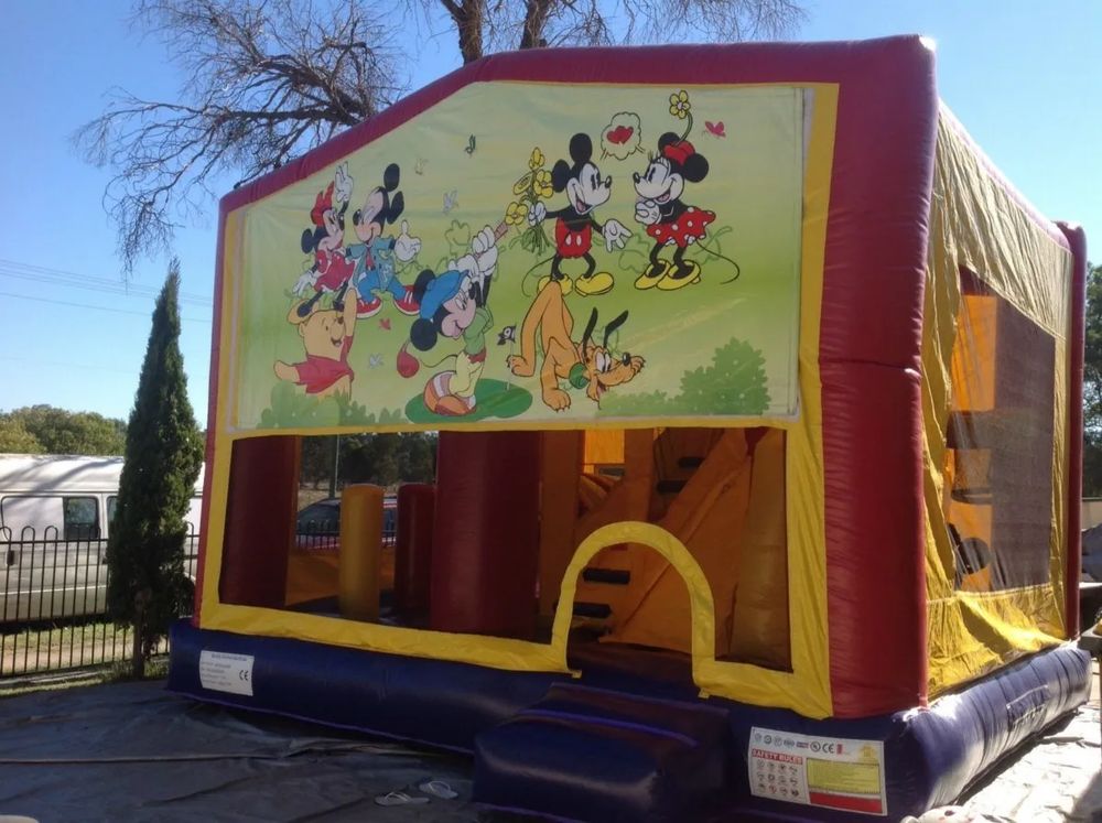 Hire MICKY MOUSE 5 IN 1 COMBO WITH SLIDE POP UPS BASKETBALL HOOP AND OBSTACLE SIZE 5X5 M, hire Jumping Castles, near Doonside
