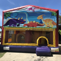 Hire CARTOON DINOSAURS JUMPING CASTLE WITH SLIDE